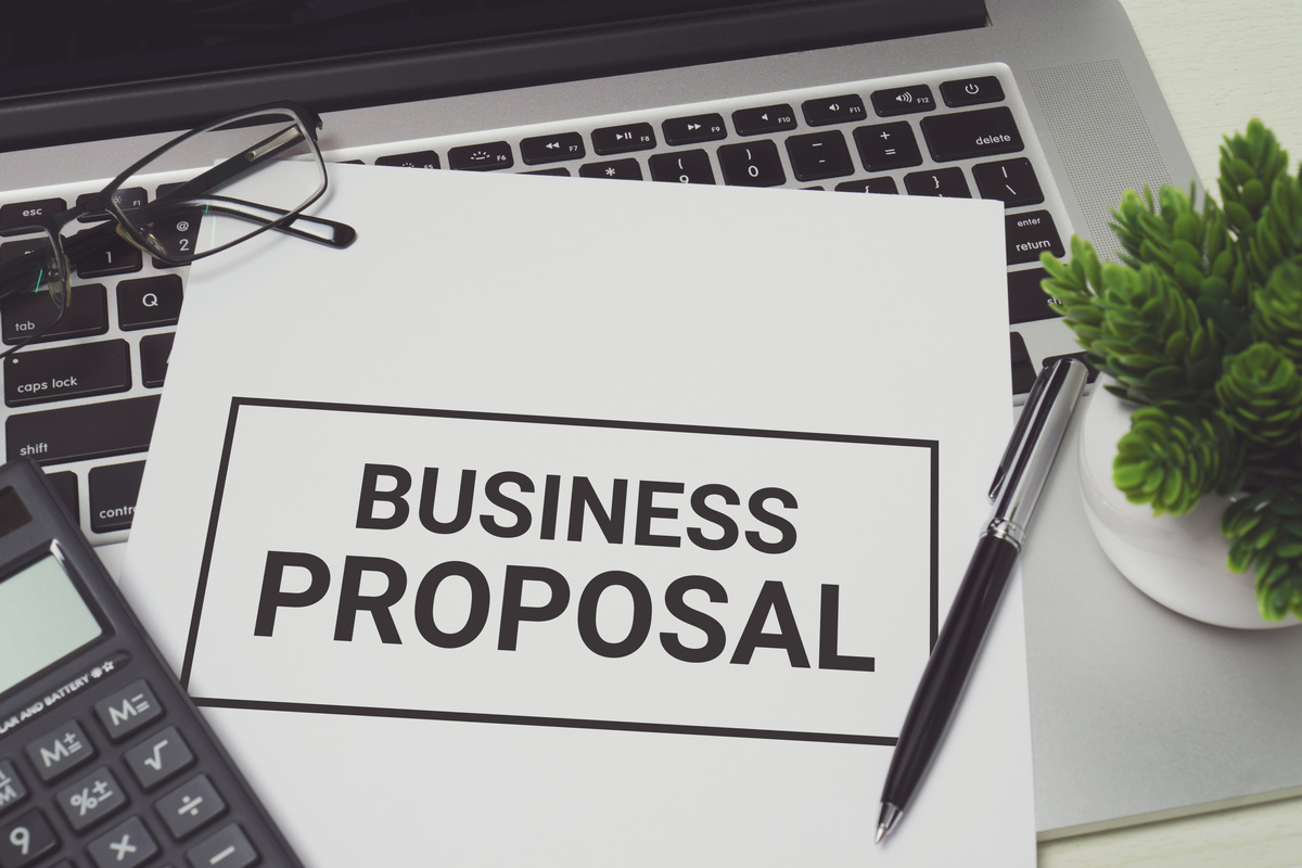 Business Proposal on white paper.